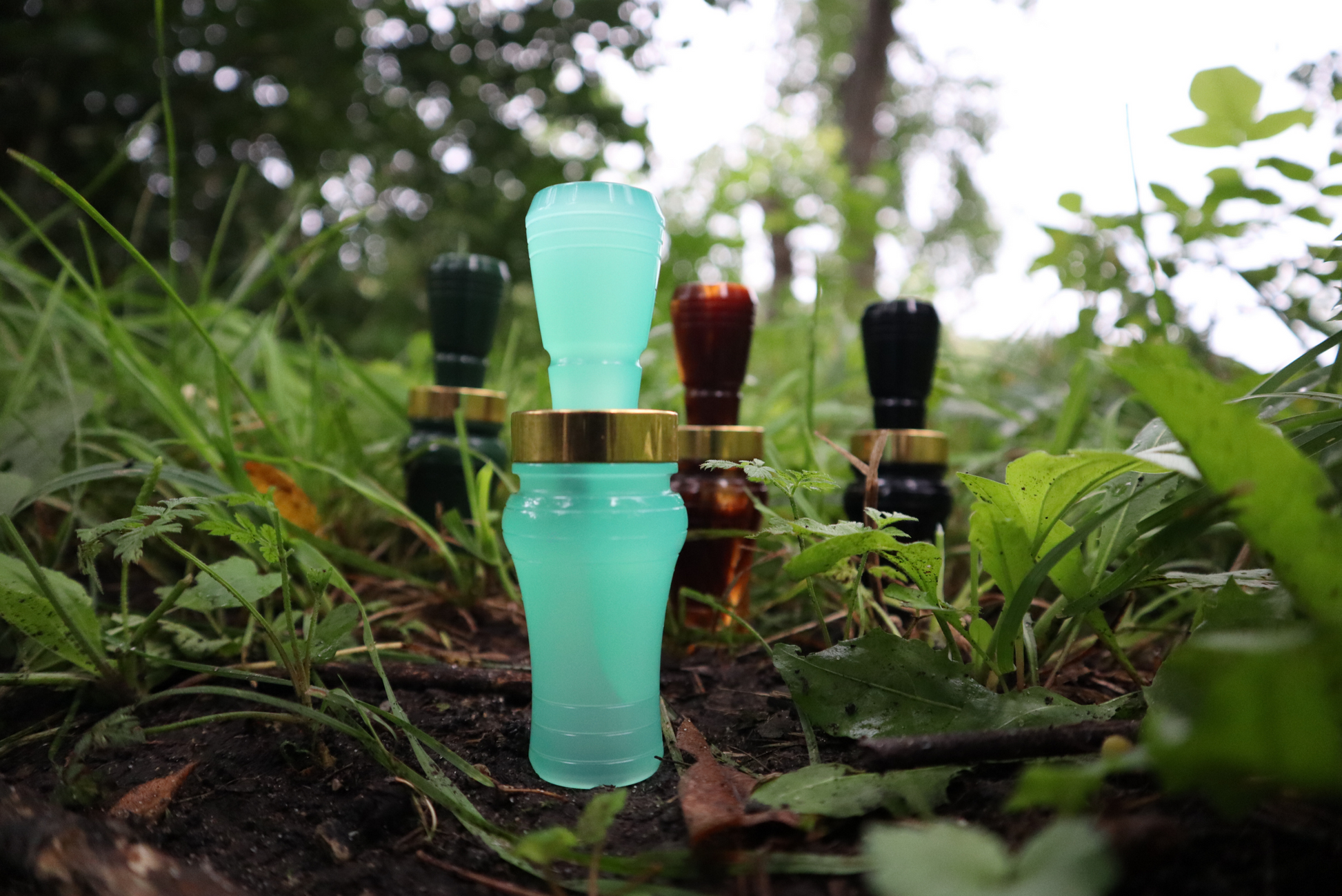 duck calls displayed in the woods